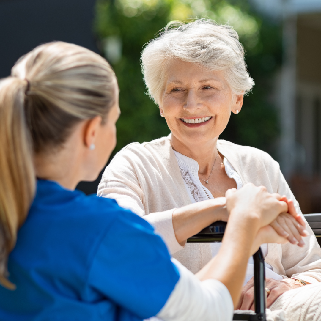 smiling seated person receiving care